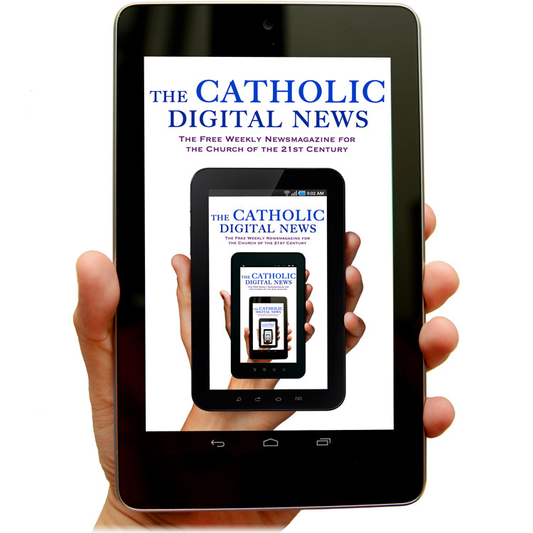 image of a hand holding The Catholic Digital News loaded onto a tablet